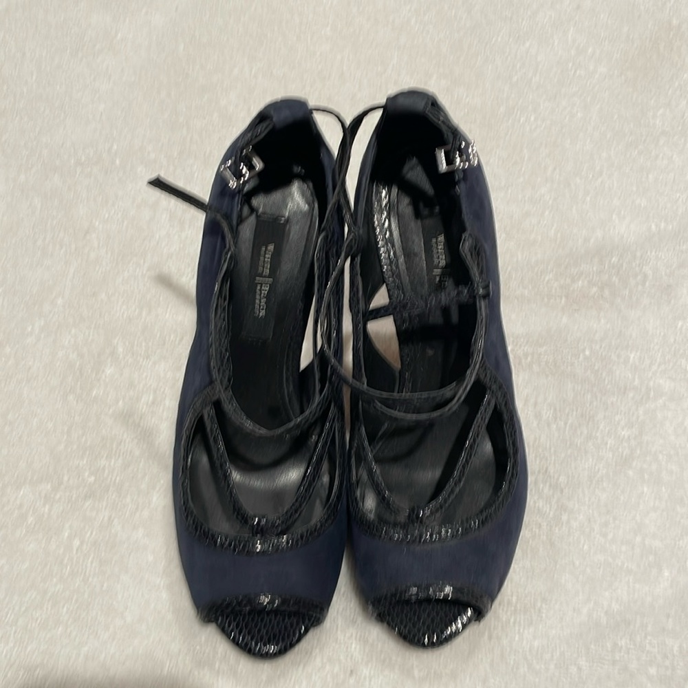 Black and white market high heels size 7M in very good condition